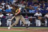 San Diego Padres' Ty France hits a two-run single against the Miami Marlins during the third inning of a baseball game, Saturday, July 25, 2026, in Miami. (AP Photo/David Santiago)