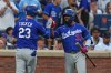 Los Angeles Dodgers' Teoscar Hernández (37) celebrates with teammate Kyle Tucker (23) after Tucker hit a home run during the third inning of a baseball game against the New York Mets Saturday, July 25, 2026, in New York. (AP Photo/Frank Franklin II)