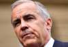 Prime Minister Mark Carney listens to questions from journalists after making a statement outside the Office of the Prime Minister and Privy Council in Ottawa, on Tuesday, July 21, 2026. THE CANADIAN PRESS/Justin Tang