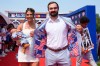 Oakland Athletics' Shea Langeliers poses as he walks with Raegan Langeliers carrying Owen Wade on the red carpet for the MLB baseball All-Star game Tuesday, July 14, 2026, in Philadelphia. (AP Photo/Chris Szagola)