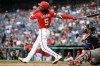 Washington Nationals' CJ Abrams hits a solo home run during the third inning of a baseball game against the Arizona Diamondbacks, Sunday, July 26, 2026, in Washington. (AP Photo/John McDonnell)