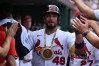 St. Louis Cardinals' Iván Herrera is congratulated by teammates after hitting a home run against the Cincinnati Reds during the third inning of a baseball game, Sunday, July 26, 2026, in St. Louis. (AP Photo/Jeff Le)