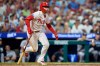 Philadelphia Phillies' Bryson Stott watches his three-run double during the sixth inning of a baseball game against the New York Yankees, Sunday, July 26, 2026, in Philadelphia. (AP Photo/Chris Szagola)