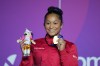 Gold medallist Canada's Lia-Monica Fontaine celebrates after winning the Women's Vault final of Artistic Gymnastics at the Commonwealth Games in Glasgow, Scotland, Monday, July 27, 2026. (AP Photo/Kin Cheung)