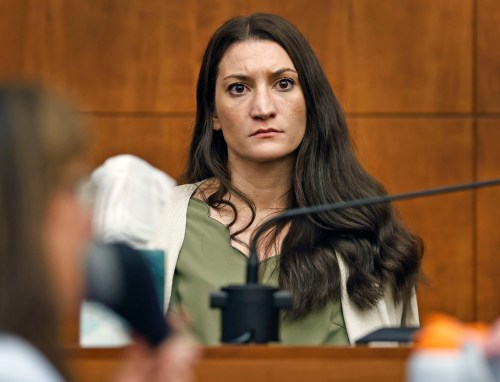 Lindsay Clancy waits for the judge to call a prospective jury member into court in her murder trial where she is charged in the 2023 killing of her three children, Wednesday, July 22, 2026, in Plymouth Superior Court in Plymouth, Mass. (Greg Derr/The Patriot Ledger via AP, Pool)