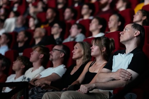 Spectators view the 70 mm Imax copy of Christopher Nolan's 