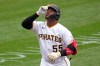 Pittsburgh Pirates' Esmerlyn Valdez celebrates as he rounds the bases after hitting a solo home run off Chicago Cubs pitcher Jameson Taillon during the second inning of a baseball game in Pittsburgh, Sunday, July 26, 2026. (AP Photo/Gene J. Puskar)