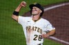 Pittsburgh Pirates' Jake Mangum celebrates after scoring on a single by Brandon Lowe off Arizona Diamondbacks pitcher Merrill Kelly during the sixth inning of a baseball game in Pittsburgh, Monday, July 27, 2026. (AP Photo/Gene J. Puskar)