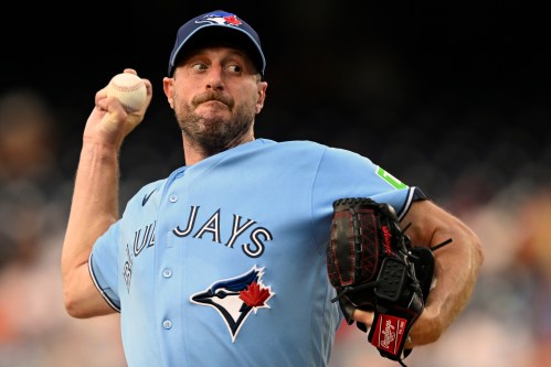 Toronto Blue Jays staring pitcher Max Scherzer throws during the second inning of a baseball game against the Washington Nationals, Monday, July 27, 2026, in Washington. (AP Photo/John McDonnell)
