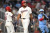 Washington Nationals' James Wood, center, walks back to the dugout after striking out during the seventh inning of a baseball game against the Toronto Blue Jays, Monday, July 27, 2026, in Washington. (AP Photo/John McDonnell)