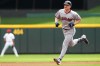 Cleveland Guardians' Kyle Manzardo rounds the bases after hitting a grand slam during the first inning in the first baseball game of a doubleheader against the Cincinnati Reds, Tuesday, July 28, 2026, in Cincinnati. (AP Photo/Kareem Elgazzar)