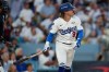 FILE - Los Angeles Dodgers' Kiké Hernández watches his home run take flight against the Toronto Blue Jays during the third inning in Game 5 of baseball's World Series, Oct. 29, 2025, in Los Angeles. (AP Photo/Ashley Landis, File)
