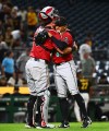 Arizona Diamondbacks pitcher Gerardo Carrillo (68) celebrates with catcher James McCann, left, after getting the final out of a baseball game against the Pittsburgh Pirates in Pittsburgh, Tuesday, July 28, 2026. (AP Photo/Justin Berl)