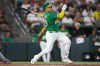 Athletics' Brian Serven hits a two-run home run during the seventh inning of a baseball game against the Boston Red Sox Tuesday, July 28, 2026, in West Sacramento, Calif. (AP Photo/Scott Marshall)