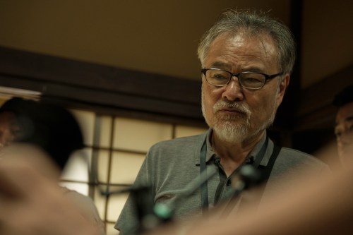 This image released by Janus Films shows Kiyoshi Kurosawa on the set of 