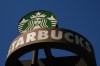 FILE - A Starbucks sign is seen outside the coffee company's global corporate headquarters, May 11, 2026, in Seattle. (AP Photo/Lindsey Wasson, File)