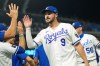 Kansas City Royals' Vinnie Pasquantino (9) celebrates with teammates after their baseball game against the San Francisco Giants, Tuesday, July 21, 2026, in Kansas City, Mo. (AP Photo/Charlie Riedel)