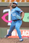 Kansas City Royals starting pitcher Randy Dobnak throws to the Minnesota Twins in the first inning of a baseball game Wednesday, July 29, 2026, in Minneapolis. (AP Photo/Bruce Kluckhohn)
