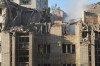 Rescuers search through the rubble of a residential building following air attack in Lviv, Ukraine, Thursday, July 30, 2026. (AP Photo/Mykola Tys)