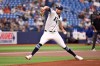 Tampa Bay Rays pitcher Shane McClanahan throws during the first inning of a baseball game against the Texas Rangers, Thursday, July 30, 2026, in St. Petersburg, Fla. (AP Photo/Jason Behnken)