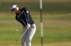 Jeeno Thitikul, of Thailand, chips onto the 14th green during the first round of the Women's British Open golf championship in Lytham St Annes, England, Thursday, July 30, 2026. (AP Photo/Jon Super)