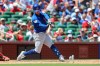 Chicago Cubs' Alex Bregman hits a double during the fourth inning of a baseball game against the St. Louis Cardinals, Thursday, July 30, 2026, in St. Louis. (AP Photo/Scott Kane)