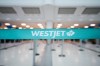 The WestJet check-in area at Pearson International Airport is photographed in Toronto, Saturday, June 29, 2024. THE CANADIAN PRESS/Christopher Katsarov