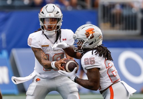 B.C. Lions quarterback Kaidon Salter (19) hands off to Emani Bailey (25) during first half CFL football action against the Winnipeg Blue Bombers in Winnipeg on Thursday, July 30, 2026. THE CANADIAN PRESS/John Woods