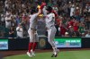 Boston Red Sox's Willson Contreras, right, celebrates with Caleb Durbin after hitting a home run during the eighth inning of a baseball game against the Athletics Thursday, July 30, 2026, in West Sacramento, Calif. (AP Photo/Sara Nevis)