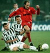FILE - Milan's veteran Franco Baresi escapes Juventus player Angelo Di Livio and Christian Vieri during a First Division soccer match in Turin on Nov. 17, 1996. (AP Photo/Mauro Pilone, File)