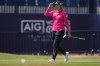 Shiho Kuwaki, of Japan, acknowledges the crowd after putting on the 18th green during the second round of the Women's British Open golf championship in Lytham St Annes, England, Friday, July 31, 2026. (AP Photo/Jon Super)