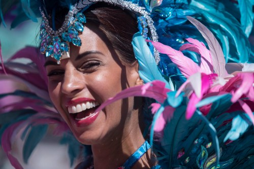 Michelle Marjadsingh with the SunLime Masquerade at Toronto Caribbean Carnival is pictured at a photo opportunity at city hall in Toronto on Friday, July 6, 2018. THE CANADIAN PRESS/Chris Young