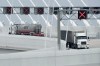 Transport trucks use the Gordie Howe International Bridge in Windsor, Ont., on its first day open to vehicles, Monday, July 27, 2026. THE CANADIAN PRESS/Dax Melmer