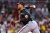 Baltimore Orioles' Yennier Cano delivers in the seventh inning during the second baseball game of a doubleheader against the Boston Red Sox, Wednesday, July 22, 2026, in Boston. (AP Photo/Charles Krupa)