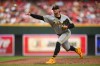 Pittsburgh Pirates' Paul Skenes pitches during the third inning of a baseball game against the Cincinnati Reds on Friday, July 31, 2026 in Cincinnati. (AP Photo/Tanner Pearson)