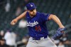FILE - Los Angeles Dodgers relief pitcher Brock Stewart delivers against the Minnesota Twins during the ninth inning of a baseball game June 23, 2026, in Minneapolis. (AP Photo/Matt Krohn, File)