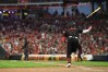 Cincinnati Reds' Sal Stewart throws his bat in the air after a hit during the eighth inning of a baseball game against the Pittsburgh Pirates Friday, July 31, 2026, in Cincinnati. (AP Photo/Tanner Pearson)