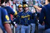 Milwaukee Brewers' Brice Turang is greeted by teammates after hitting a two-run home run during the fifth inning of a baseball game against the Los Angeles Angels, Friday, July 31, 2026, in Anaheim, Calif. (AP Photo/William Liang)