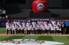 Members of the 1986 New York Mets team that won a World Series and family members pose for a group photo during a reunion celebration for the team, Saturday, Aug. 1, 2026, in New York. (AP Photo/Heather Khalifa)