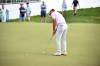 Michael Brennan putts on the 18th green during the first round of the Rocket Classic golf tournament at the Detroit Golf Club, Thursday, July 30, 2026, in Detroit. (AP Photo/Jose Juarez)