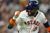 Houston Astros' Taylor Trammell celebrates after hitting a two-run single against the Texas Rangers during the third inning of a baseball game Saturday, Aug. 1, 2026, in Houston. (AP Photo/David J. Phillip)