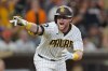 San Diego Padres' Jake Cronenworth celebrates after hitting a walk off single during the ninth inning as the Padres defeated the San Francisco Giants 6-5 in a baseball game Saturday, Aug. 1, 2026, in San Diego. (AP Photo/Gregory Bull)