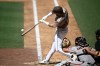 San Diego Padres' Jackson Merrill hits a single during the seventh inning of a baseball game against the San Francisco Giants, Sunday, Aug. 2, 2026, in San Diego. (AP Photo/Denis Poroy)