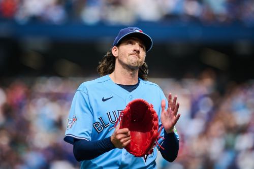 Toronto Blue Jays' Kevin Gausman (34) applauds to the crowd as he is taken out of the game by manager John Schneider during sixth inning MLB baseball action against the St. Louis Cardinals in Toronto, on Saturday, Aug. 1, 2026. THE CANADIAN PRESS/Sammy Kogan