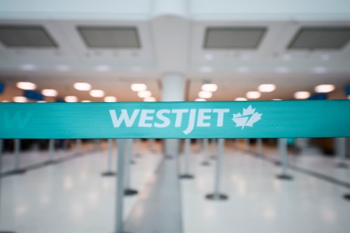 The WestJet check-in area at Pearson International Airport is photographed in Toronto, Saturday, June 29, 2024. THE CANADIAN PRESS/Christopher Katsarov”
