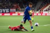 Thun's Brighton Labeau, bottom, and Zagreb's Sergi Dominguez battle for the ball during a Champions League second qualifying round soccer match between Switzerland's FC Thun and Croatia's Dinamo Zagreb, Tuesday, July 21, 2026, at the Visana Stadion in Thun, Switzerland. (Peter Klaunzer/Keystone via AP)