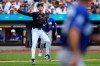 New York Mets pitcher Luke Weaver throws out Los Angeles Dodgers' Teoscar Hernández at first base during the eighth inning of a baseball game, Sunday, July 26, 2026, in New York. (AP Photo/Yuki Iwamura)