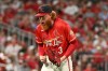 St. Louis Cardinals pitcher Dustin May reacts after an out against Cincinnati Reds' JJ Bleday during the fifth inning of a baseball game, Friday, July 24, 2026, in St. Louis. (AP Photo/Jeff Le)