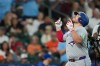 Toronto Blue Jays' Alejandro Kirk celebrates after hitting a home run against the Houston Astros during the second inning of a baseball game Monday, Aug. 3, 2026, in Houston. (AP Photo/David J. Phillip)