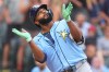 Tampa Bay Rays' Junior Caminero celebrates as he crosses home plate after hitting a two-run home run off Colorado Rockies starting pitcher Michael Lorenzen in the first inning of a baseball game Monday, Aug. 3, 2026, in Denver. (AP Photo/David Zalubowski)